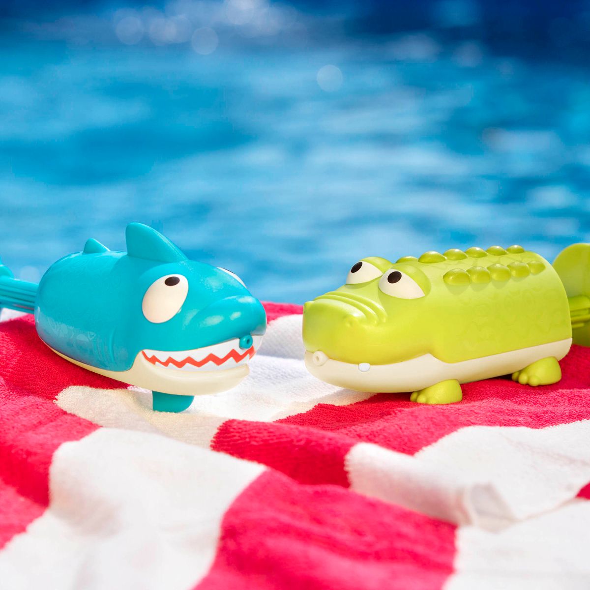 Crocodile and shark water squirt toys